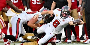 Oct 12, 2025; Tampa, Florida, USA; Tampa Bay Buccaneers quarterback Baker Mayfield (6) dives for a first down during the third quarter against the San Francisco 49ers at Raymond James Stadium. Mandatory Credit: Jonathan Dyer-Imagn Images