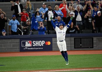 Oct 20, 2025; Toronto, Ontario, CAN; Toronto Blue Jays right fielder George Springer (4) celebrates as he runs the bases after hitting a three run home run against the Seattle Mariners in the seventh inning during game seven of the ALCS round for the 2025 MLB playoffs at Rogers Centre. Mandatory Credit: Dan Hamilton-Imagn Images